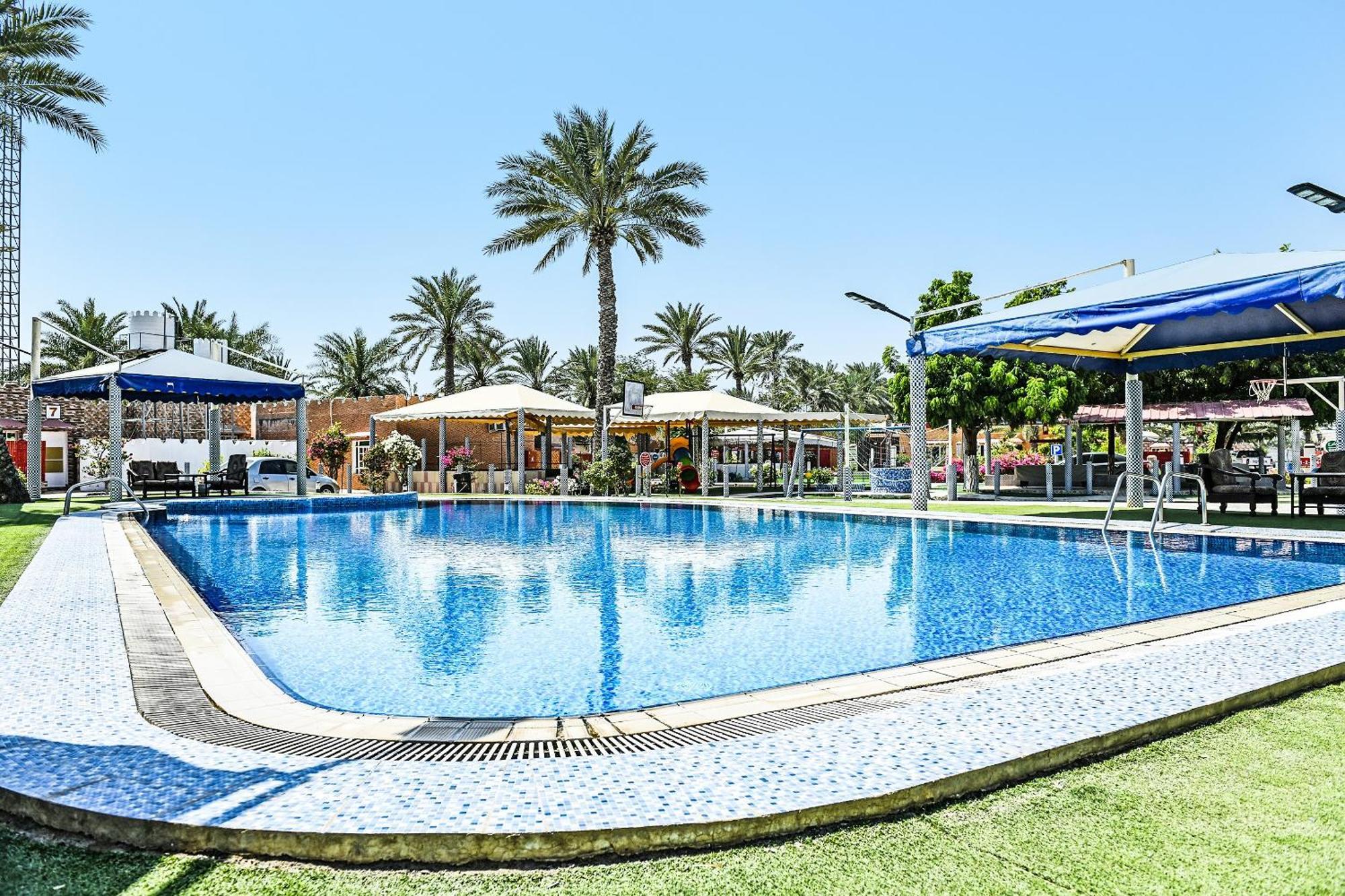 Oyo 138 Gulf Sand Motel بركة المظهر الخارجي الصورة
