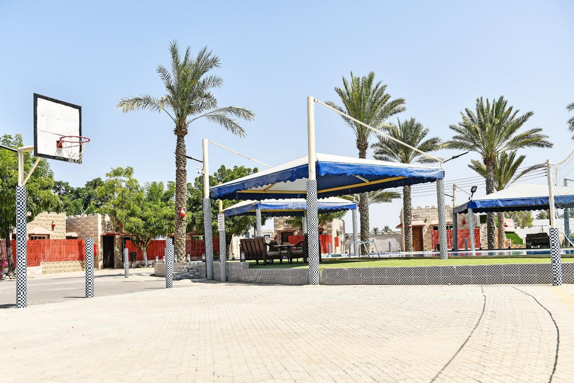 Oyo 138 Gulf Sand Motel بركة المظهر الخارجي الصورة
