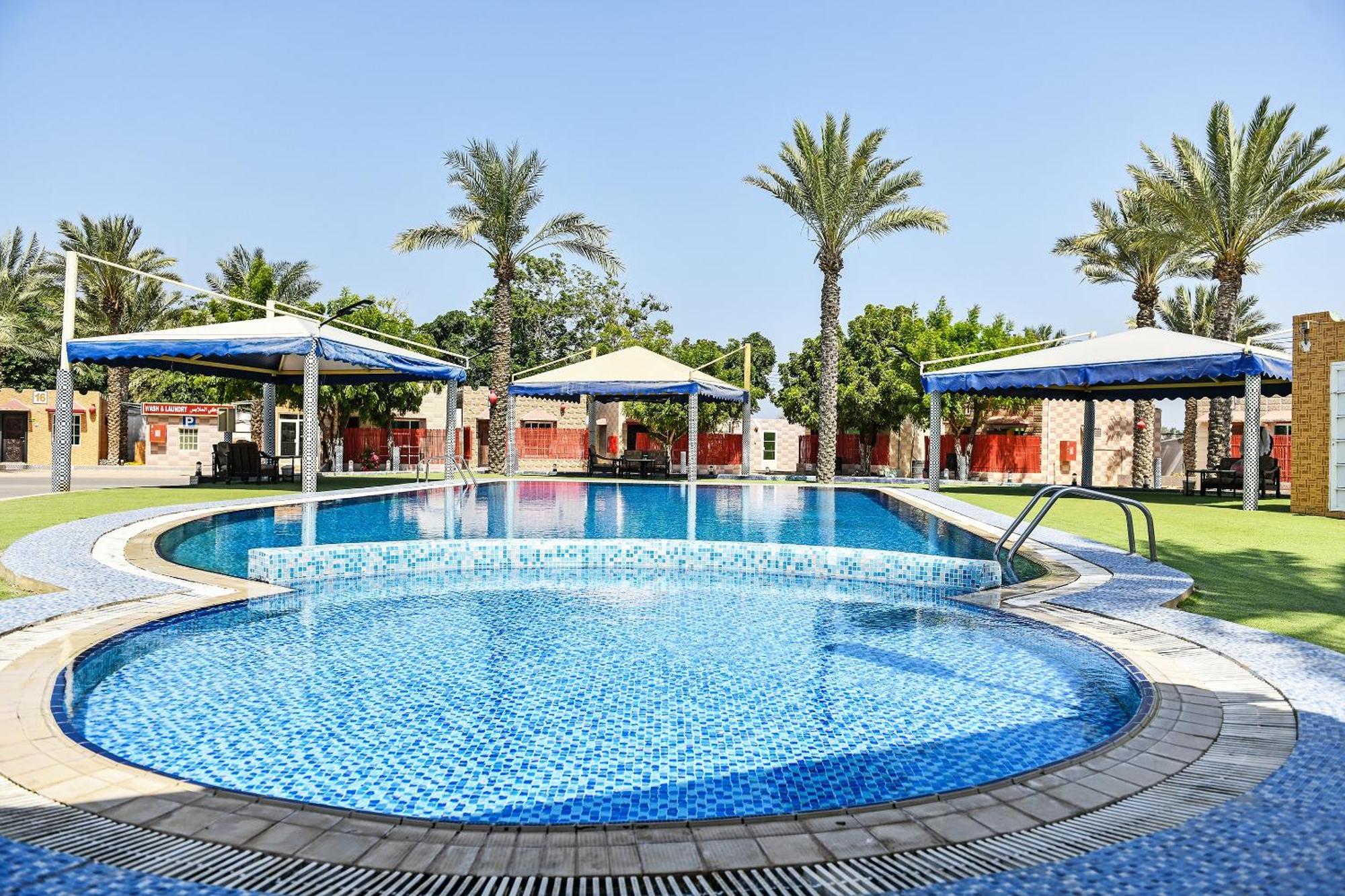 Oyo 138 Gulf Sand Motel بركة المظهر الخارجي الصورة