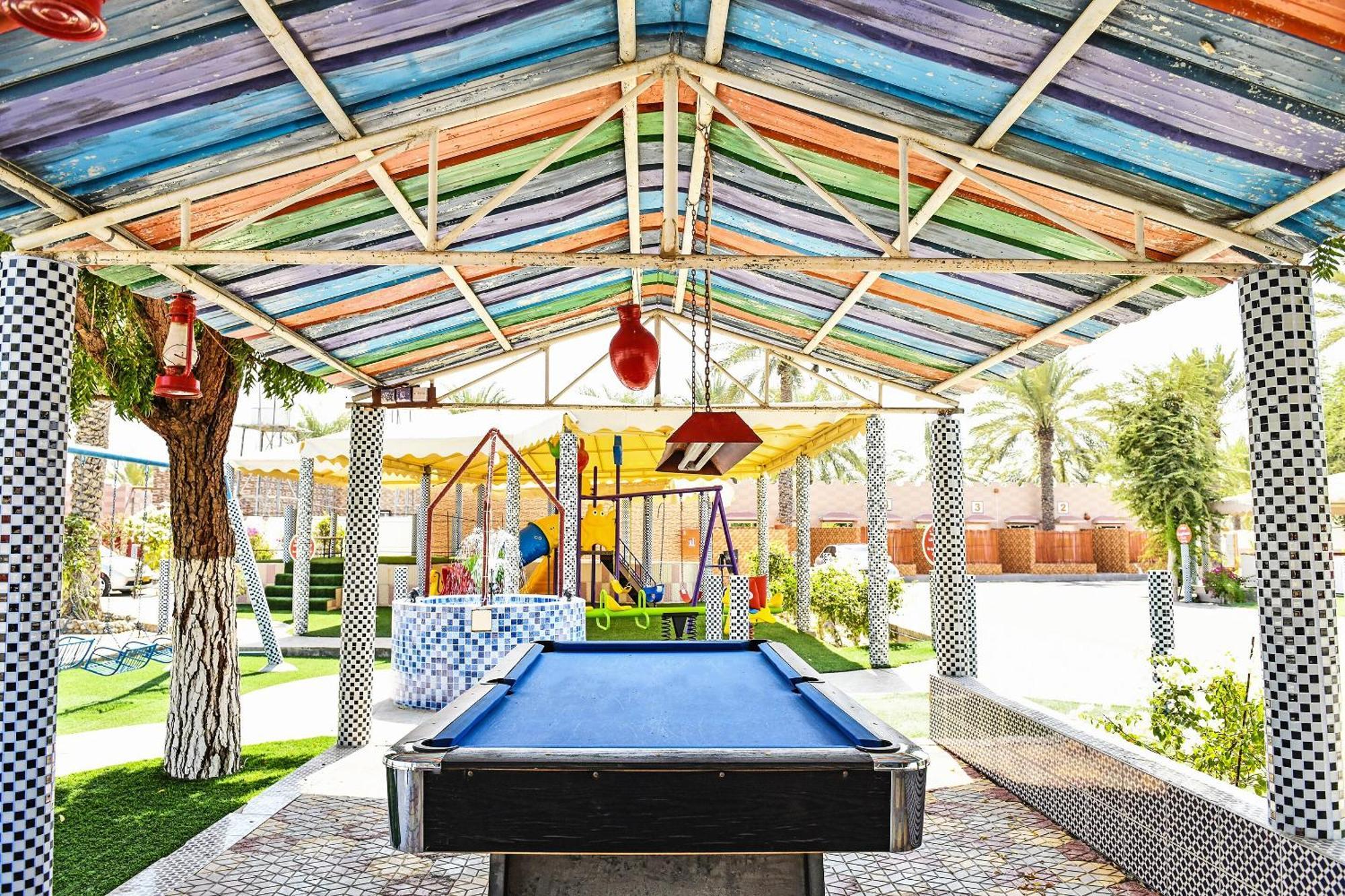 Oyo 138 Gulf Sand Motel بركة المظهر الخارجي الصورة